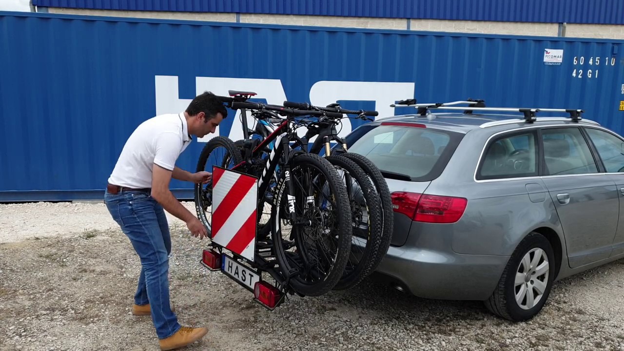 es obligatorio llevar placa v20 en portabicis